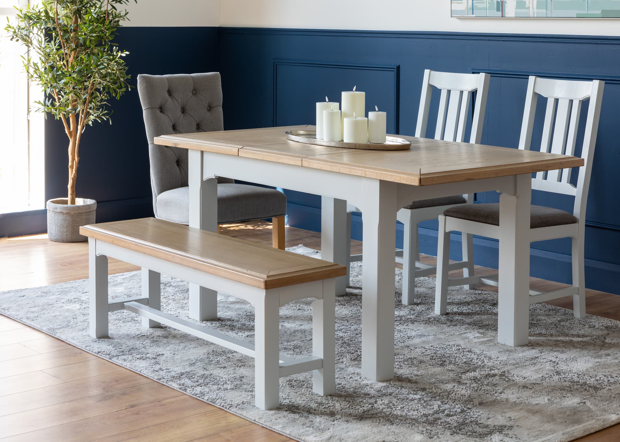 Dining room with bench and outlet chairs