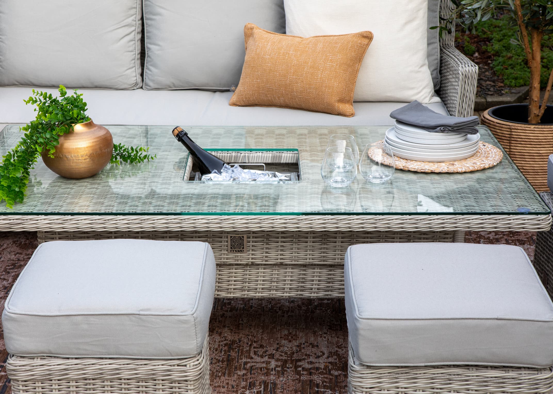 Garden table with ice store bucket in middle