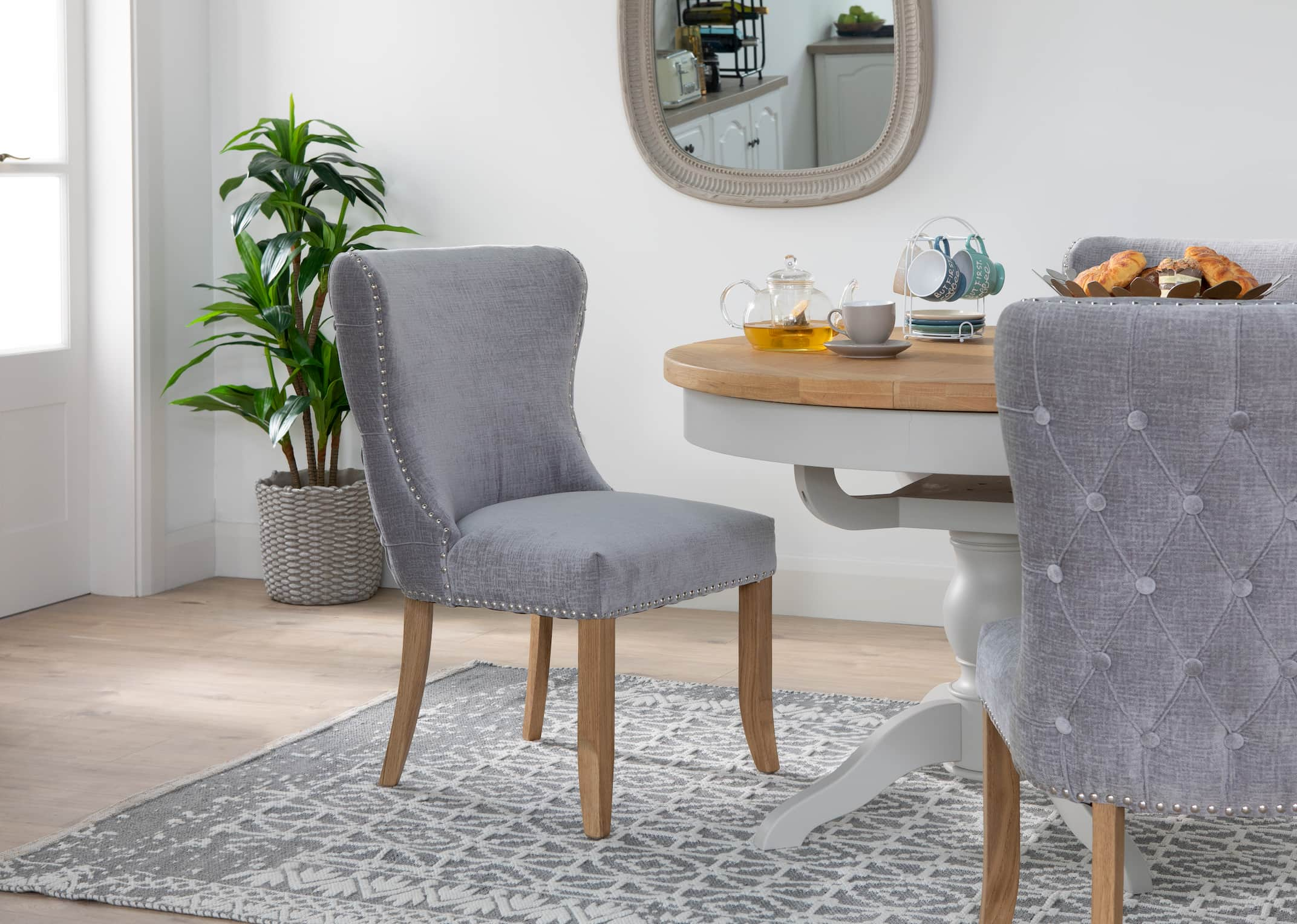 Marble table and on sale grey chairs